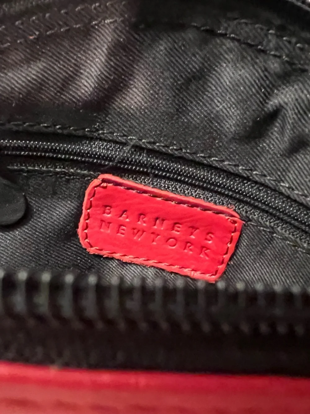 Barney’s New York. Red and Black Leather Zipper Cosmetic Case w/ Leather Tassel